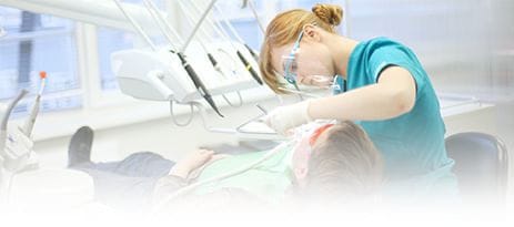 Dental Tech working on a patient