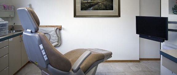 Seat near a tv screen in exam room